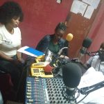 JCU staff participates at a live radio talkshow to reach out to the people of Bundibugyo