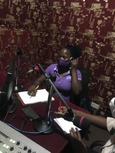 JCU employee at Impact radio live talk show